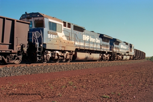 229-06
Yandi Two at the 311.5 km with an empty BHP train heading for the loadout behind mid-train Goninan rebuild CM40-8M GE units 5657 'Fukuyama' serial 8412-02 / 94-148 trailing lead remote sister unit 5660. [url=https://goo.gl/maps/DcycDGojcBt]GeoData[/url].
Keywords: 5657;Goninan;GE;CM40-8M;8412-02/94-148;rebuild;Comeng-NSW;ALCo;M636C;5492;C6084-8;