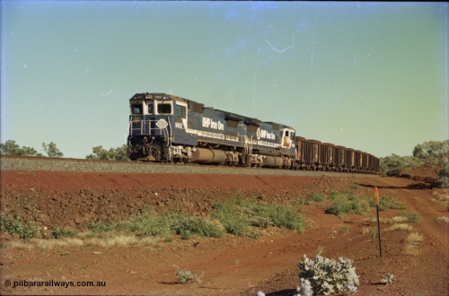 231-00
Yandi Two balloon loop, BHP Iron Ore 5652 'Villanueva' serial 8412-09 / 93-143 an Goninan WA rebuild CM40-8M GE unit loads a train at 1.2 km/h with second unit 5650. [url=https://goo.gl/maps/3vQHZqBXNa32]GeoData[/url].
Keywords: 5652;Goninan;GE;CM40-8M;8412-09/93-143;rebuild;AE-Goodwin;ALCo;M636C;5482;G6061-3;