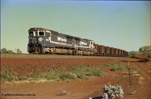 231-01
Yandi Two balloon loop, BHP Iron Ore 5652 'Villanueva' serial 8412-09 / 93-143 an Goninan WA rebuild CM40-8M GE unit loads a train at 1.2 km/h with second unit 5650. [url=https://goo.gl/maps/3vQHZqBXNa32]GeoData[/url].
Keywords: 5652;Goninan;GE;CM40-8M;8412-09/93-143;rebuild;AE-Goodwin;ALCo;M636C;5482;G6061-3;