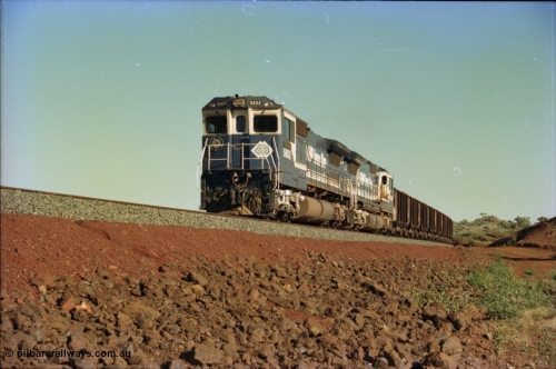 231-02
Yandi Two balloon loop, BHP Iron Ore 5652 'Villanueva' serial 8412-09 / 93-143 an Goninan WA rebuild CM40-8M GE unit loads a train at 1.2 km/h with second unit 5650. [url=https://goo.gl/maps/3vQHZqBXNa32]GeoData[/url].
Keywords: 5652;Goninan;GE;CM40-8M;8412-09/93-143;rebuild;AE-Goodwin;ALCo;M636C;5482;G6061-3;