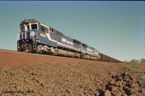 231-20
Yandi Two balloon loop, BHP Iron Ore 5652 'Villanueva' serial 8412-09 / 93-143 an Goninan WA rebuild CM40-8M GE unit loads a train at 1.2 km/h with second unit 5650. [url=https://goo.gl/maps/3vQHZqBXNa32]GeoData[/url].
Keywords: 5652;Goninan;GE;CM40-8M;8412-09/93-143;rebuild;AE-Goodwin;ALCo;M636C;5482;G6061-3;