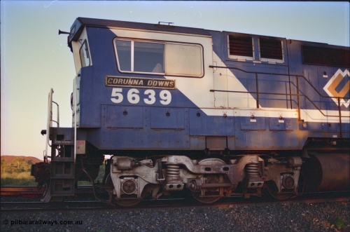 232-18
Yandi One backtrack, following a cyclone shutdown of the mainline and severe flooding around Yandi a 'mixed' freight train was operated to Yandi to deliver food, mail and diesel fuel to the mine and camp. Here BHP Iron Ore CM40-8M unit 5639 'Corunna Downs' serial 8281-03 / 92-128 idles away in the backtrack awaiting its path back to Port Hedland with flat waggon 6703, four fuel tank waggons and a broken ore waggon. February 1997. [url=https://goo.gl/maps/6c1WFqjYSg42]GeoData[/url].
Keywords: 5639;Goninan;GE;CM40-8M;8281-03/92-128;rebuild;AE-Goodwin;ALCo;C636;5459;G6027-3;