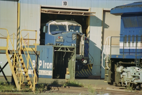 236-05
Nelson Point, Loco Overhaul Shop, BHP AC6000 class locomotive 6072 'Hesta', a General Electric built AC6000 model, serial 51064, seen here in the shed having the windscreen protectors or 'blinkers' fitted.
Keywords: 6072;GE;AC6000;51064;
