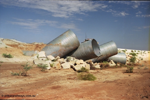 237-01
Water damaged culverts located on the upper reaches of the Edgina Creek, near the Woodstock South location on the BHP Newman line. [url=https://goo.gl/maps/kRVDYtxmRC42] Geo Data [/url].
