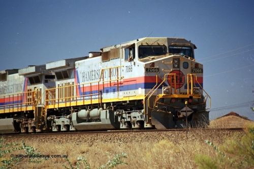 237-37
Dugite Siding, empty train in the passing track behind Hamersley Iron General Electric model Dash 9-44CW unit 7066 with serial 47745. [url=https://goo.gl/maps/6og1H2khBAu] Geodata [/url].
Keywords: 7066;GE;Dash-9-44CW;47745;