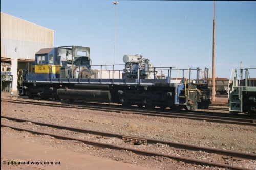 238-18
Nelson Point loco overhaul shop sees former Southern Pacific loco 3079 EMD model SD40, serial number 7861-52 with the long hood removed due to the 645 prime mover failing not long after arrival in Australia. 27th January 2004. [url=https://goo.gl/maps/rqoN9uK26rQ2] Geodata [/url].
Keywords: 3079;EMD;SD40;31542/7861-52;SP8461;