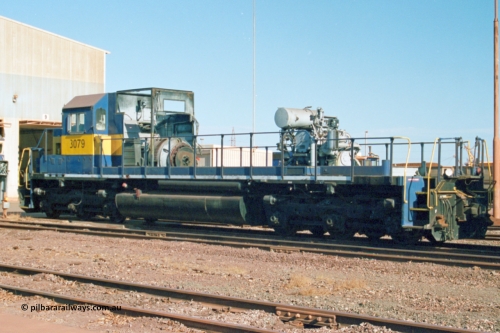 238-20
Nelson Point loco overhaul shop sees former Southern Pacific loco 3079 EMD model SD40, serial number 7861-52 with the long hood removed due to the 645 prime mover failing not long after arrival in Australia. 27th January 2004. [url=https://goo.gl/maps/rqoN9uK26rQ2] Geodata [/url].
Keywords: 3079;EMD;SD40;31542/7861-52;SP8461;