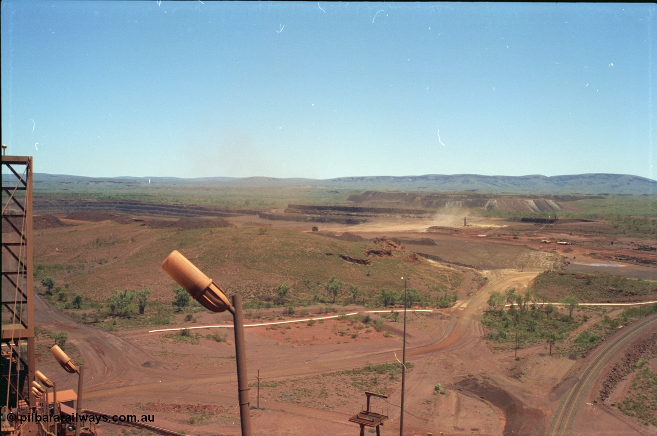 239-04
Overview looking south west from the radial stacker towards the Yandi One mine pit. [url=https://goo.gl/maps/hApNXoLtbtQ2]GeoData[/url].
