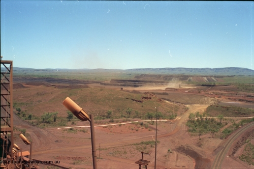 239-04
Overview looking south west from the radial stacker towards the Yandi One mine pit. [url=https://goo.gl/maps/hApNXoLtbtQ2]GeoData[/url].
