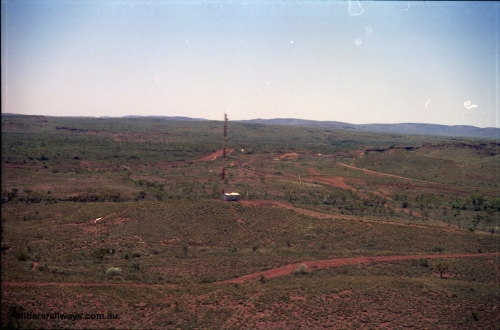 239-06
View from the radial stacker at Yandi One looking north at the Yandi Repeater for the rail communication system. [url=https://goo.gl/maps/hApNXoLtbtQ2]GeoData[/url].
