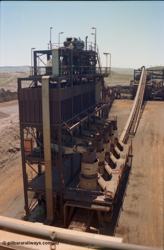 239-17
View of Yandi One OHP looking from the secondary crusher north west back at the 'new side' of tertiary crushers. The screen house can be seen in the background. [url=https://goo.gl/maps/gpgfApaAJYt]GeoData[/url].

