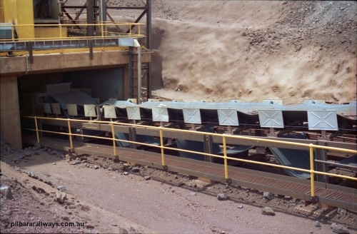 239-29
Yandi Two, conveyor belt CV202 failure to the belt on the primary crushing circuit. Shows belt rolls bunched up near exit from primary jaw type crusher. [url=https://goo.gl/maps/VrKABdiRp9P2]GeoData[/url].
