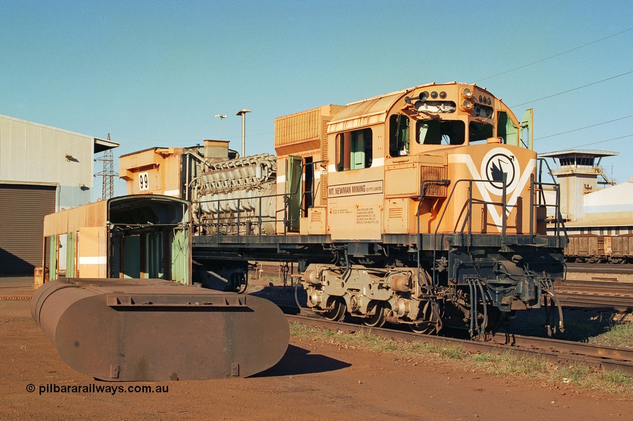 240-01
Nelson Point, retired Mt Newman Mining Comeng NSW built ALCo M636 unit 5499 serial C6096-4 sits awaiting its engine removal prior to being sent by road to Rail Heritage WA's Museum at Bassendean, Perth for preservation. 25th June 2002.
Keywords: 5499;Comeng-NSW;ALCo;M636;C6096-4;