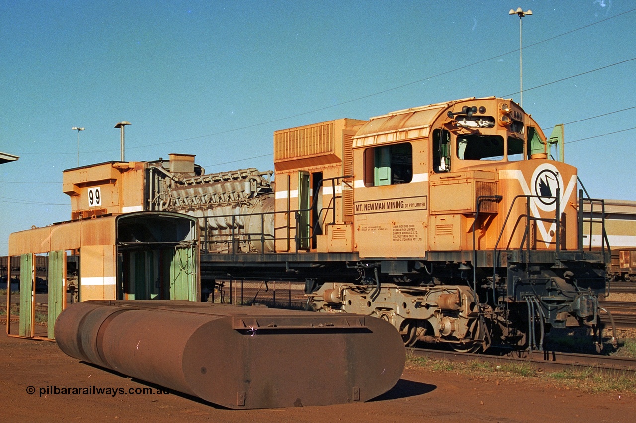 240-02
Nelson Point, retired Mt Newman Mining Comeng NSW built ALCo M636 unit 5499 serial C6096-4 sits awaiting its engine removal prior to being sent by road to Rail Heritage WA's Museum at Bassendean, Perth for preservation. 25th June 2002.
Keywords: 5499;Comeng-NSW;ALCo;M636;C6096-4;