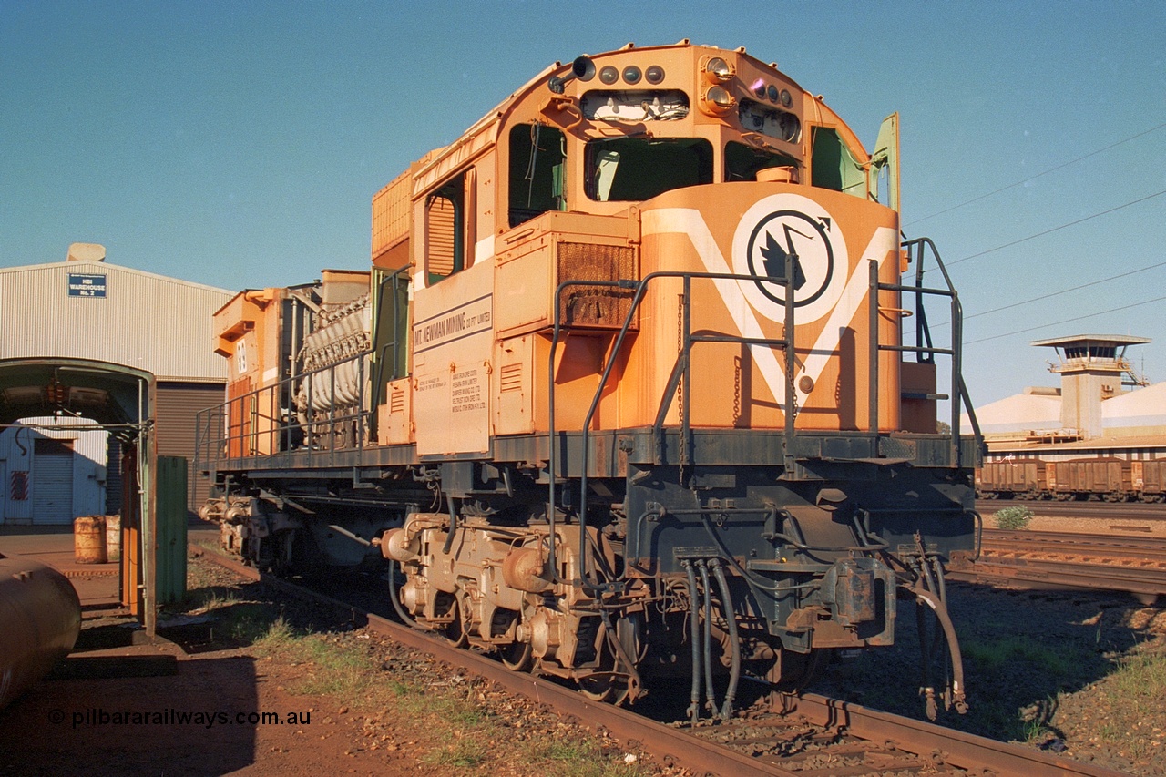 240-09
Nelson Point, retired Mt Newman Mining Comeng NSW built ALCo M636 unit 5499 serial C6096-4 sits awaiting its engine removal prior to being sent by road to Rail Heritage WA's Museum at Bassendean, Perth for preservation. 25th June 2002.
Keywords: 5499;Comeng-NSW;ALCo;M636;C6096-4;