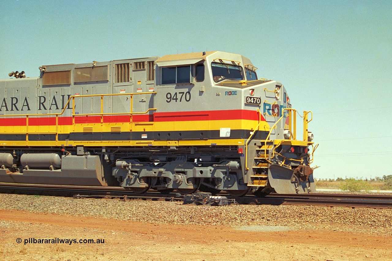 240-30
Seven Mile, Pilbara Rail, Robe River owned, General Electric built Dash 9-44CW unit 9470 serial 53455. This and sister units 9471 and 9472 were the first painted in the Pilbara Rail livery. 31st August 2002.
Keywords: 9470;GE;Dash-9-44CW;53455;