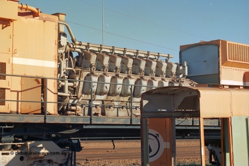 240-05
Nelson Point, retired Mt Newman Mining Comeng NSW built ALCo M636 unit 5499 serial C6096-4 sits with the hood removed exposing the ALCo 251F engine prior to removal and being sent by road to Rail Heritage WA's Bassendean museum for preservation. 25th June 2002.
Keywords: 5499;Comeng-NSW;MLW-ALCo;M636;C6096-4;251F;