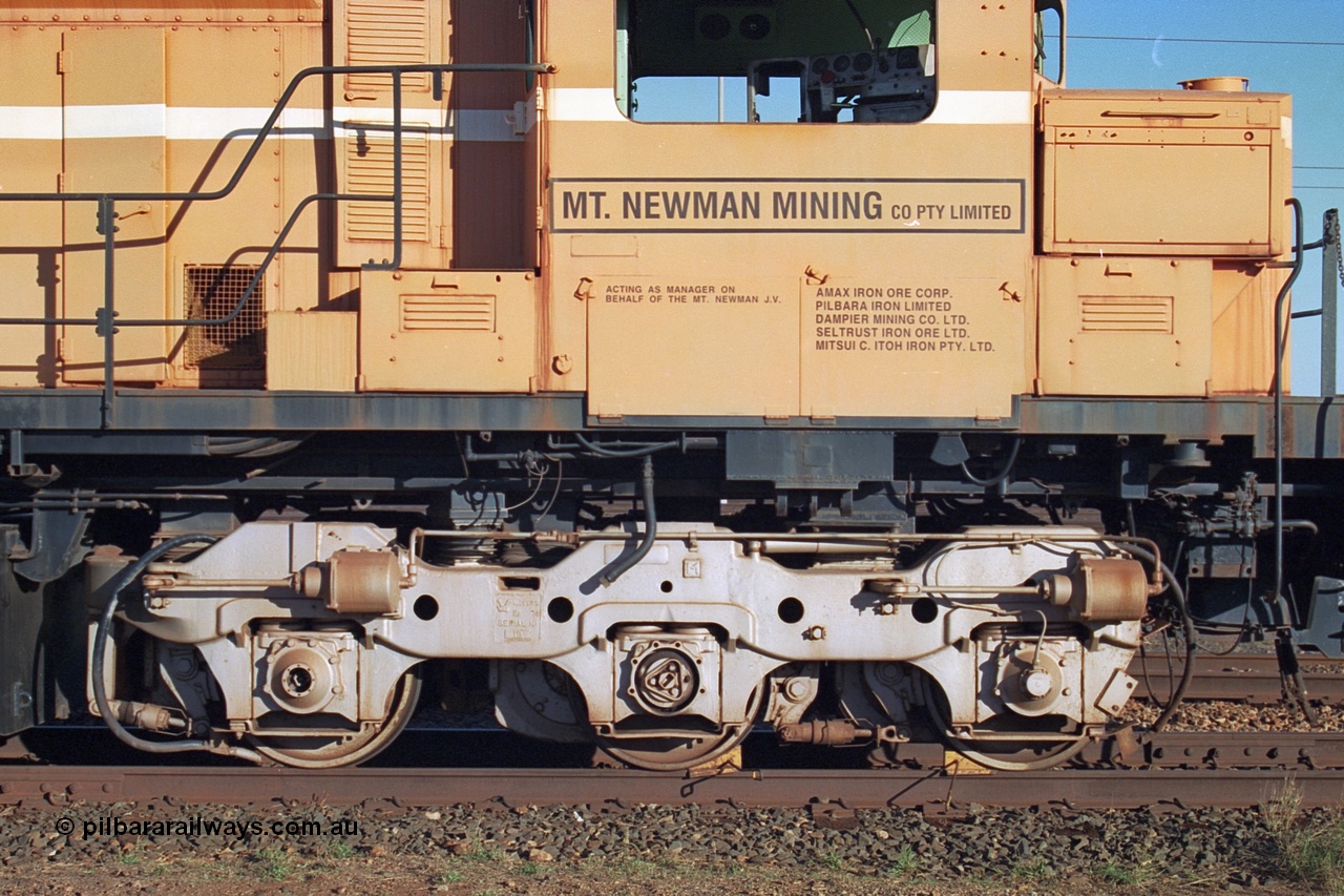 241-23
Nelson Point, Mt Newman Mining's last in-service ALCo M636 unit 5499 serial C6096-4 built by Comeng NSW sits awaiting partial dismantling before being sent by road to Rail Heritage WA's museum at Bassendean, Perth for preservation. Drivers side cab view. June 2002.
Keywords: 5499;Comeng-NSW;ALCo;M636;C6096-4;