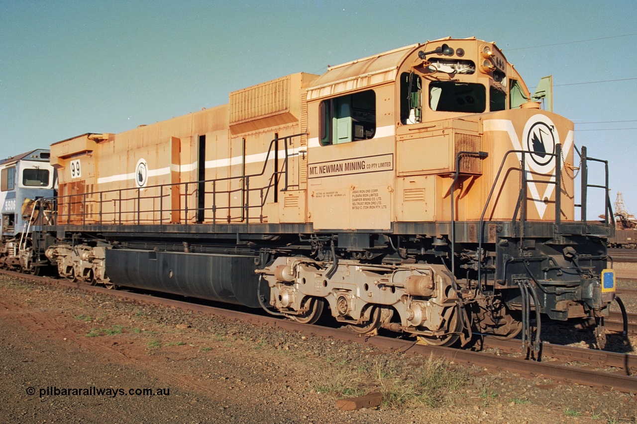 241-25
Nelson Point, Mt Newman Mining's last in-service ALCo M636 unit 5499 serial C6096-4 built by Comeng NSW sits awaiting partial dismantling before being sent by road to Rail Heritage WA's museum at Bassendean, Perth for preservation. June 2002.
Keywords: 5499;Comeng-NSW;ALCo;M636;C6096-4;
