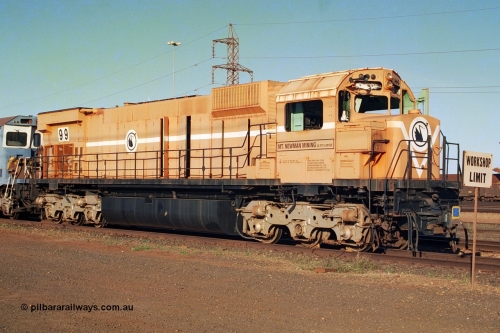241-01
Nelson Point, Mt Newman Mining's last in-service ALCo M636 unit 5499 serial C6096-4 built by Comeng NSW sits awaiting partial dismantling before being sent by road to Rail Heritage WA's museum at Bassendean, Perth for preservation. June 2002.
Keywords: 5499;Comeng-NSW;MLW-ALCo;M636;C6096-4;