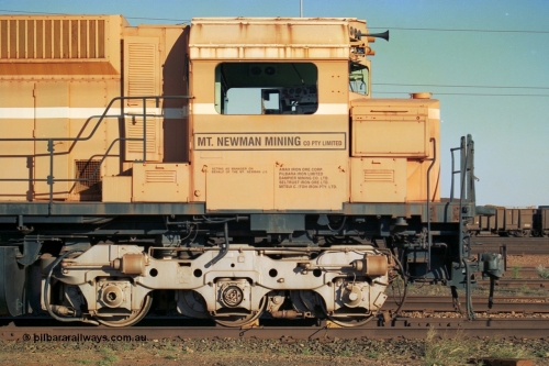 241-07
Nelson Point, Mt Newman Mining's last in-service ALCo M636 unit 5499 serial C6096-4 built by Comeng NSW sits awaiting partial dismantling before being sent by road to Rail Heritage WA's museum at Bassendean, Perth for preservation, cab side view. June 2002.
Keywords: 5499;Comeng-NSW;MLW-ALCo;M636;C6096-4;