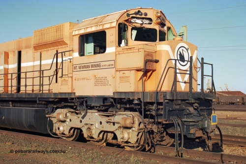 241-27
Nelson Point, Mt Newman Mining's last in-service ALCo M636 unit 5499 serial C6096--4 built by Comeng NSW sits awaiting partial dismantling before being sent by road to Rail Heritage WA's museum at Bassendean, Perth for preservation. Drivers side front view of the cab with pilot missing. June 2002.
Keywords: 5499;Comeng-NSW;MLW-ALCo;M636;C6096-4;