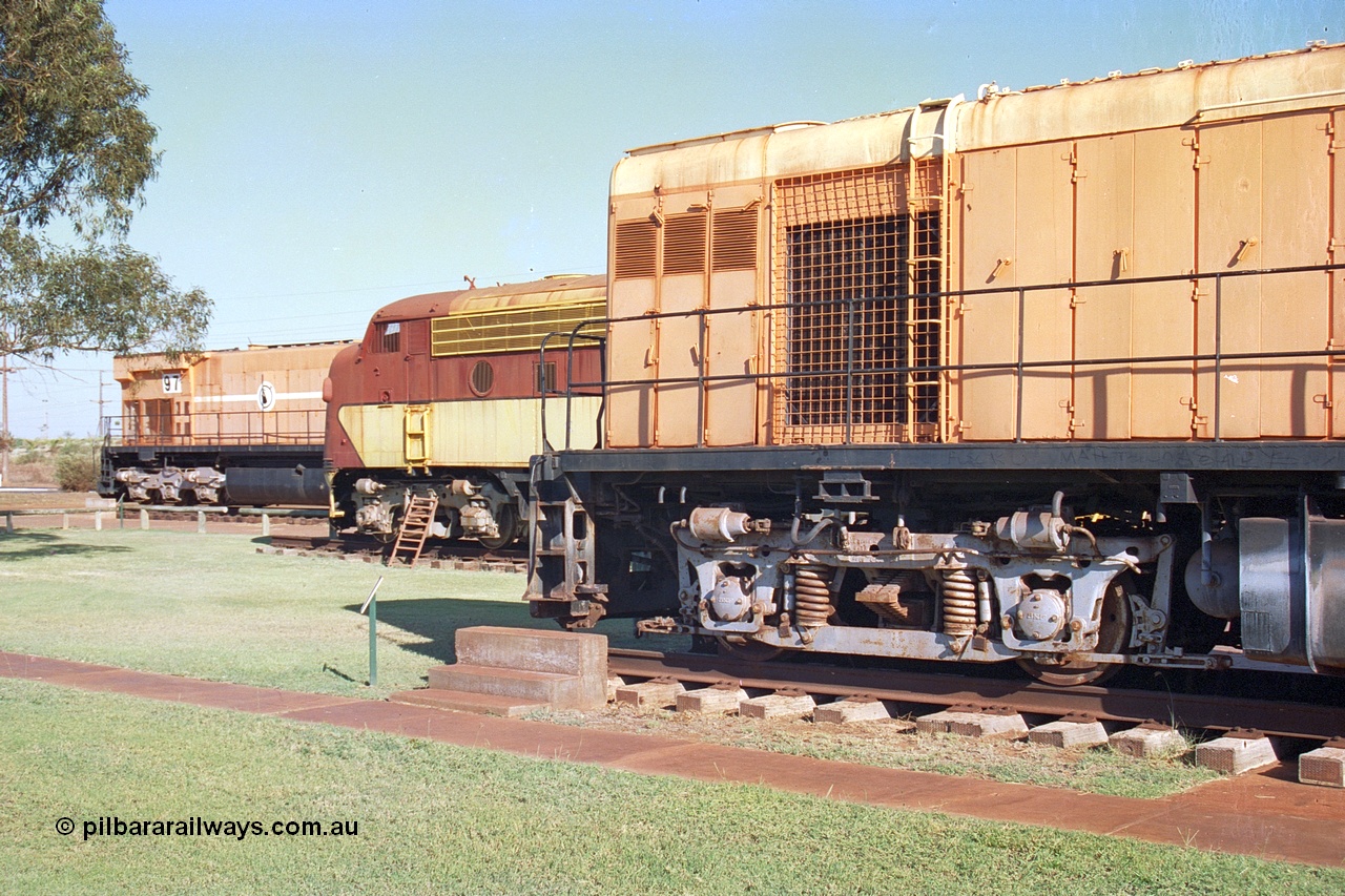 242-25
Port Hedland, Don Rhodes Mining Museum, preserved locomotives from the early days of the Port Hedland iron ore miners of Goldsworthy Mining and Mt Newman Mining. From right is a Goldsworthy Mining B class unit #2 built by English Electric serial number A-105, Mt Newman Mining 5451 which was built by EMD as an F7A model and started life with Western Pacific in the USA and Mt Newman Mining 5497, a Comeng NSW built M636 ALCo unit. May 2002.
