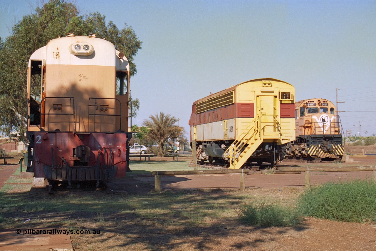 242-26
Port Hedland, Don Rhodes Mining Museum, preserved locomotives from the early days of the Port Hedland iron ore miners of Goldsworthy Mining and Mt Newman Mining. From left is a Goldsworthy Mining B class unit #2 built by English Electric serial number A-105, Mt Newman Mining 5451 which was built by EMD as an F7A model and started life with Western Pacific in the USA and Mt Newman Mining 5497, a Comeng NSW built M636 ALCo unit. May 2002.
