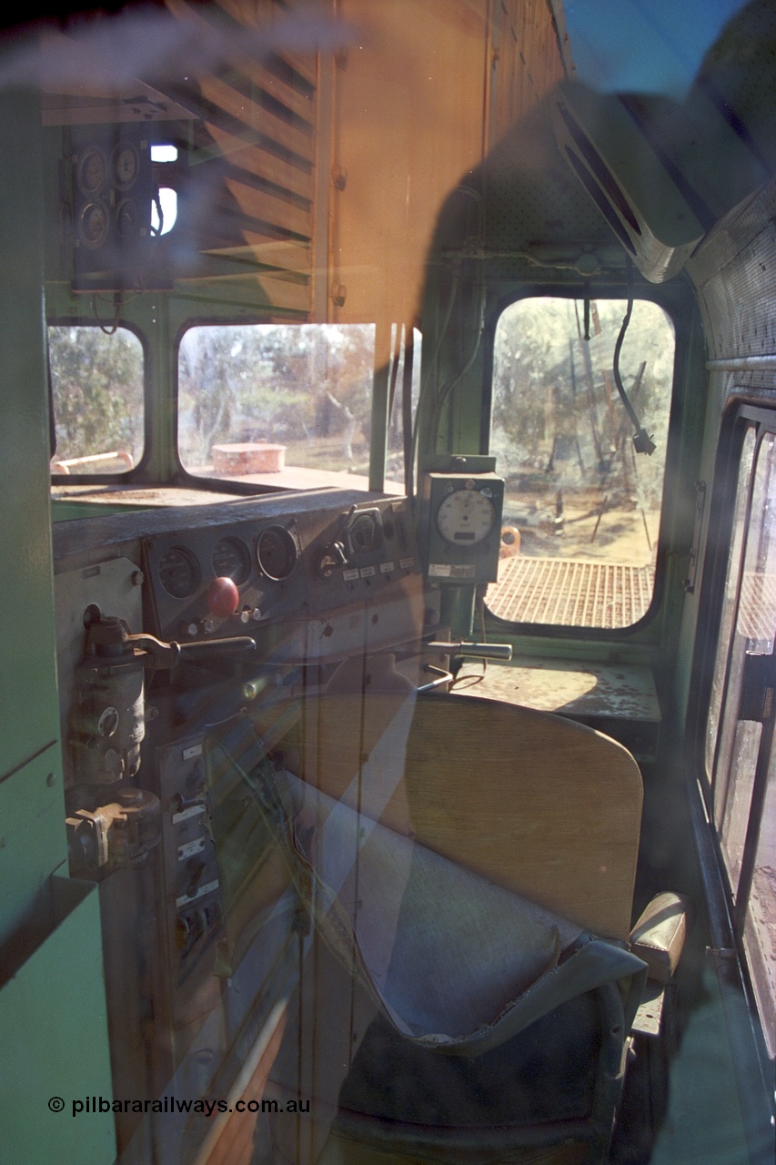 242-31
Port Hedland, Don Rhodes Mining Museum, preserved Mt Newman Mining Comeng NSW built ALCo M636 unit 5497 serial C6096-2, view looking into driving cab. May 2002.
Keywords: 5497;Comeng-NSW;ALCo;M636;C6096-2;