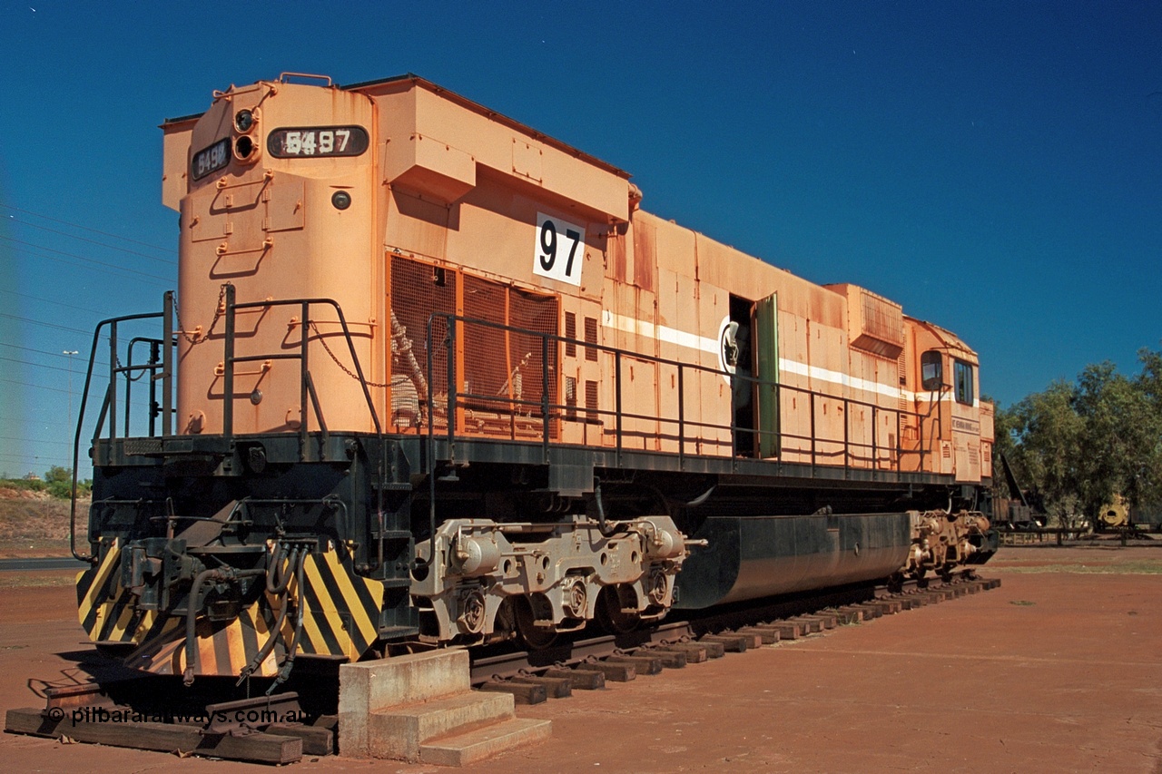 243-02
Port Hedland, Don Rhodes Mining Museum, preserved Mt Newman Mining Comeng NSW built ALCo M636 unit 5497 serial C6096-2 stands in the morning sunlight. August 2003.
Keywords: 5497;Comeng-NSW;ALCo;M636;C6096-2;