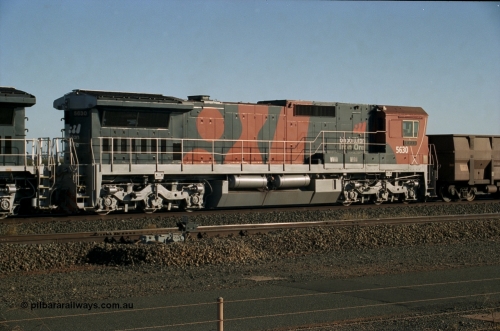 243-20
Nelson Point departure yard, BHP Billiton's CM39-8 unit 5630 'Zeus' serial 5831-09 / 88-079 and built new by Goninan in the new 'earth' or 'bubble' livery as it trails an empty train waiting departure time. August 2003.
Keywords: 5630;Goninan;GE;CM39-8;5831-09/88-079;