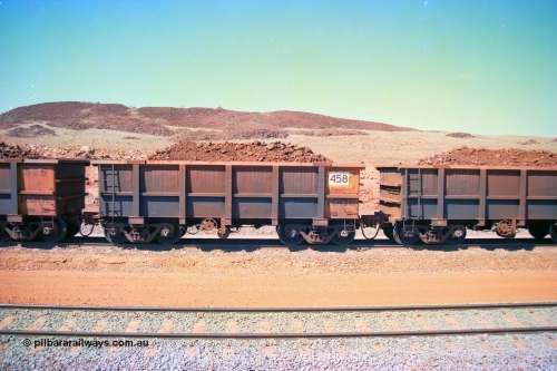 246-34
Cape Lambert, a Robe River loaded Deepdale train on the mainline with waggon 458 a Tomlinson Steel WA build. The ore is a ROM product and will be dumped over the gyratory crusher to be correctly sized. 22nd May 2002.
Keywords: 458;Tomlinson-Steel-WA;J-series;