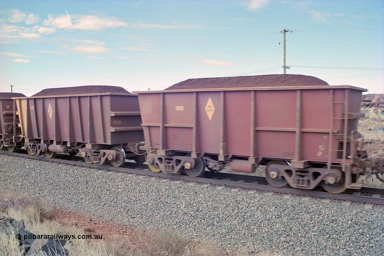249-34
Loaded Hamersley Iron ore waggon pair Tomlinson Steel WA built 5708 and Nippon Sharyo Japan built 906. Approximate [url=https://goo.gl/maps/UUfj15vTkvBaPCaw8]location[/url]. 18th December 1999.
Keywords: M-series;
