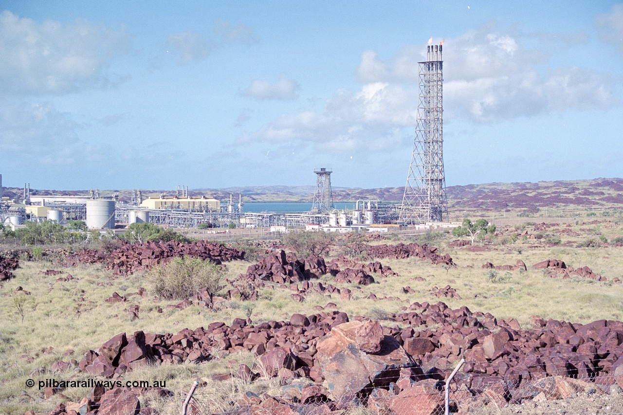 249-35
Burrup Peninsula gas plant, view of plant and flare tower. Approximate [url=https://goo.gl/maps/VnJ1jpgZBkq1ZPtR7]location[/url]. 18th December 1999.
