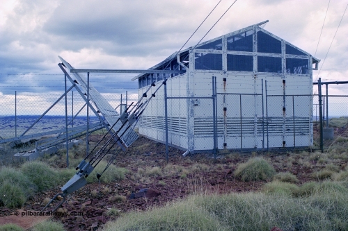 249-19
Table Hill on the Robe River railway line, a microwave radio communications site powered by solar panels. Approximate [url=https://goo.gl/maps/QPmscRiNeoYNZyME8]location[/url].
