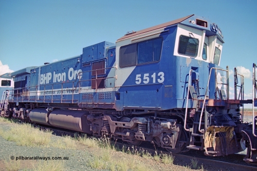 251-05
Nelson Point, BHP's recently retired Goninan WA ALCo C636 to GE C36-7M rebuild unit 5513 awaits its fate. Rebuilt in 1988 at Goninan's Welshpool factory from 1970 AE Goodwin built ALCo C636 with serial number G6012-2 and road number 5453 and assigned new serial number 4839-02 / 88-078. It was delivered in Mt Newman Mining orange and was named Kalgan. 22nd April 2000.
Keywords: 5513;Goninan;GE;C36-7M;4839-02/88-078;rebuild;AE-Goodwin;ALCo;C636;5453;G6012-2;