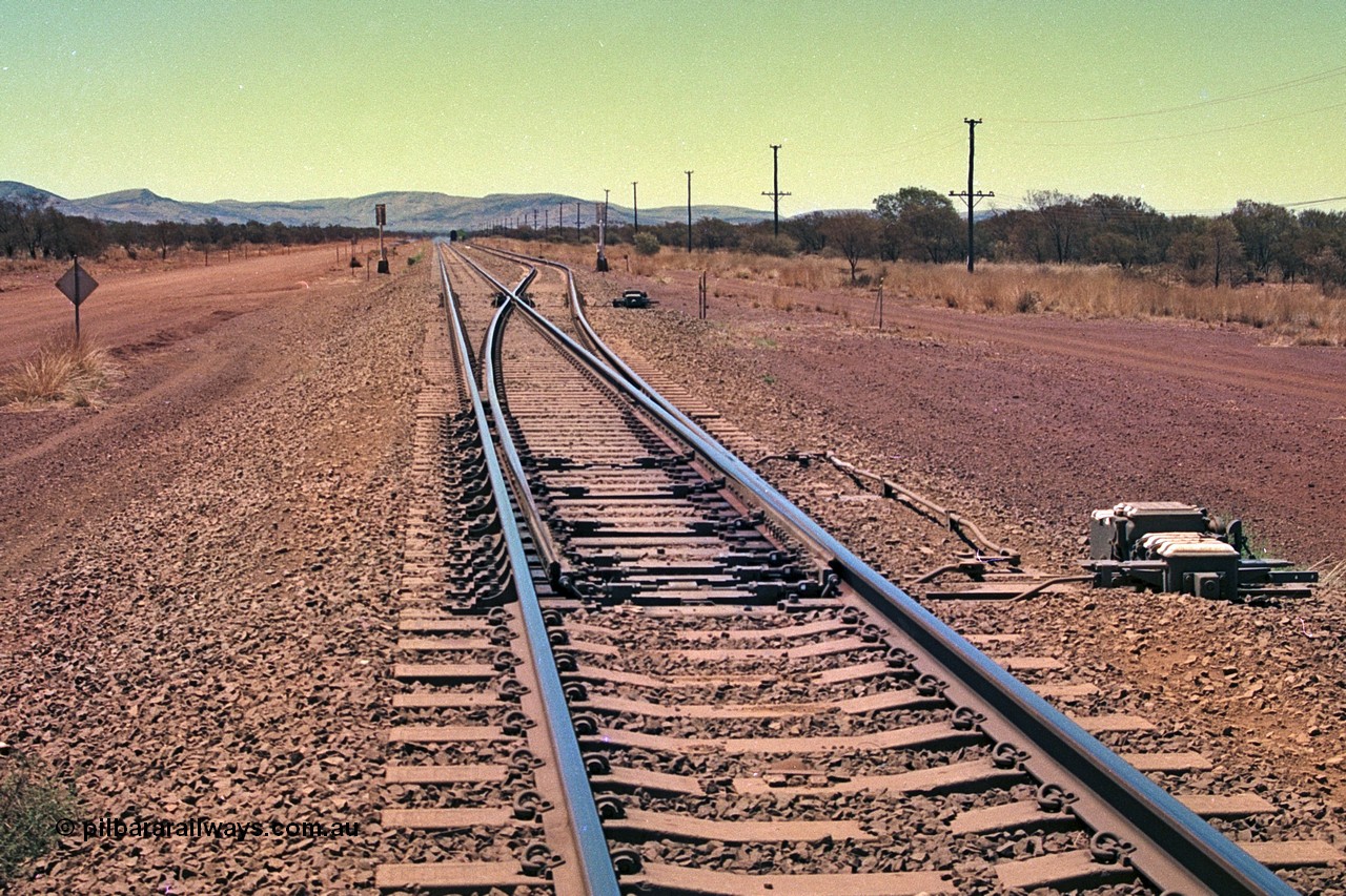 252-18
Rosella Siding looking north from the south end. Dampier is 250 km away. Location is roughly [url=https://goo.gl/maps/q3opSy2bPxpd8nv79]here[/url]. 24th November 2001.
