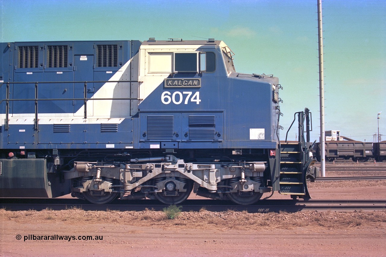 252-22
Nelson Point cab side view of BHP Iron Ore's General Electric built AC6000 unit 6074 'Kalgan' serial number 51066 is shutdown near the wheel lathe. Early December 2001.
Keywords: 6074;GE;AC6000;51066;