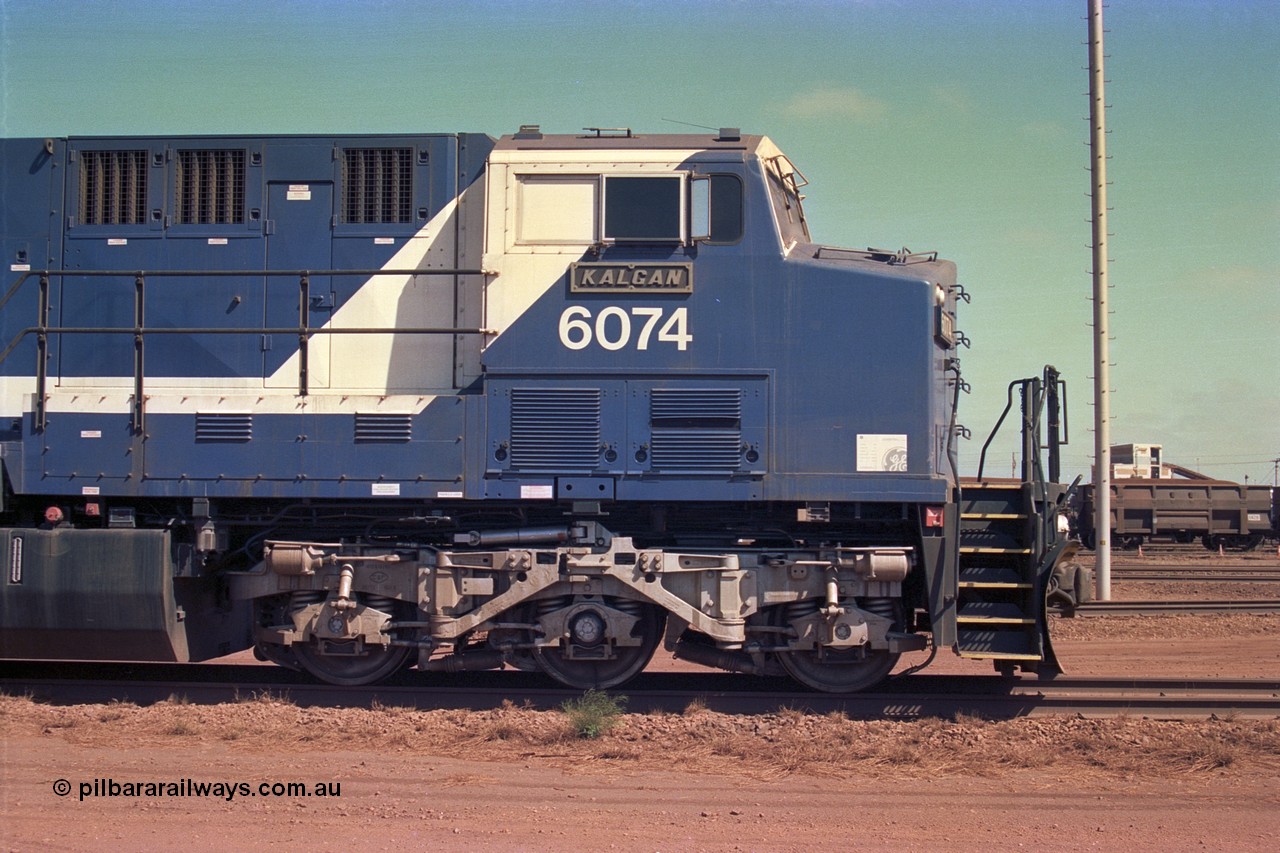 252-23
Nelson Point cab side view of BHP Iron Ore's General Electric built AC6000 unit 6074 'Kalgan' serial number 51066 is shutdown near the wheel lathe. Early December 2001.
Keywords: 6074;GE;AC6000;51066;