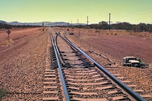 252-18
Rosella Siding looking north from the south end. Dampier is 250 km away. Location is roughly [url=https://goo.gl/maps/q3opSy2bPxpd8nv79]here[/url]. 24th November 2001.
