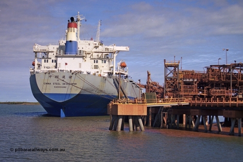 253-18
View of Nelson Point B Berth with the vessel China Steel Developer being loaded, China Steel Developer carries the IMO #9171424 and was completed in November 1998 by CSBC Corporation at Kaohsiung in Taiwan with yard number 688, reported as scrapped at Gadani Beach 27th May 2016.
