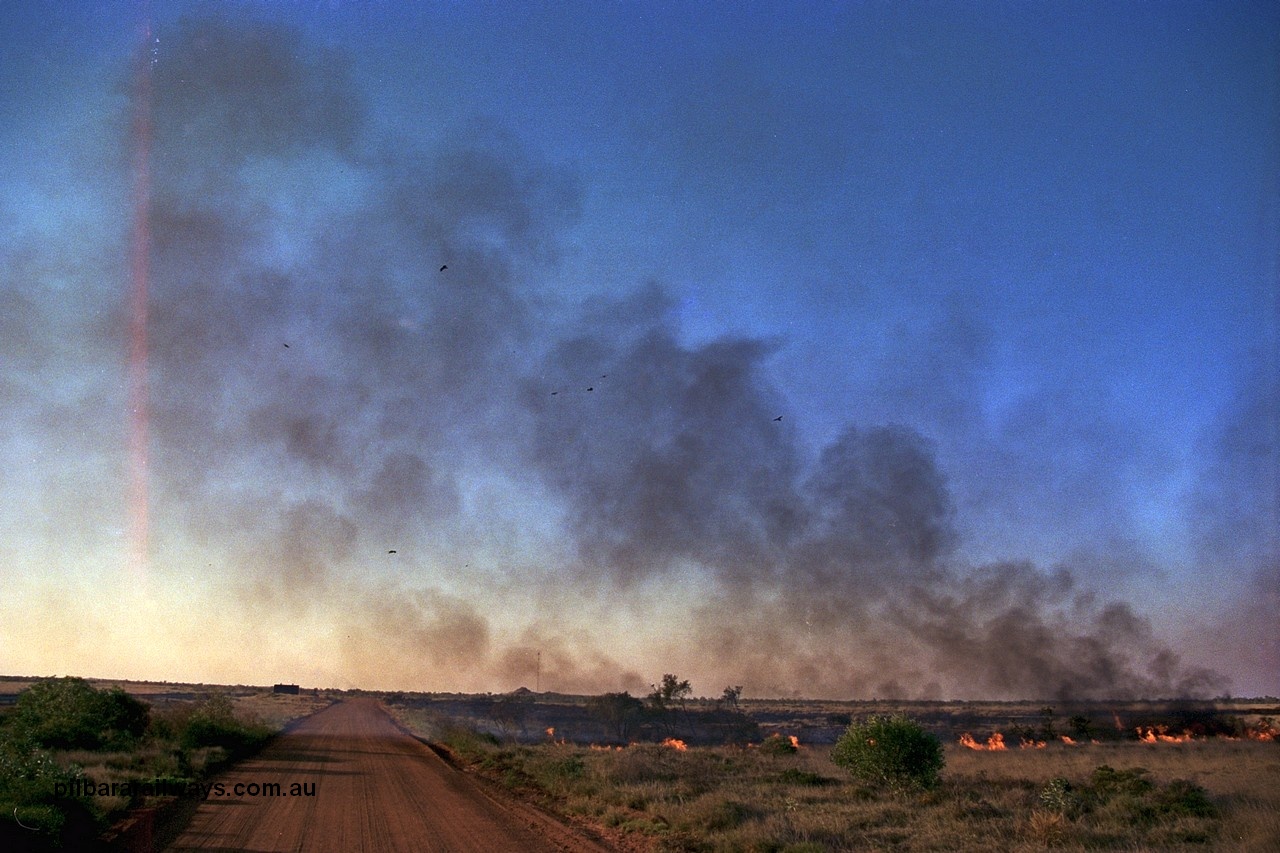254-06
Walla Siding, 55 km area, spinifex fire beside the access road.

