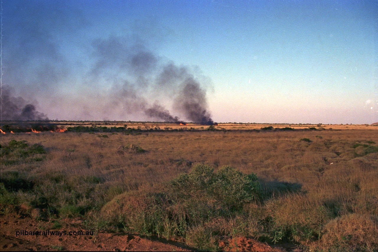 254-07
Walla Siding, 55 km area, spinifex fire beside the access road.
