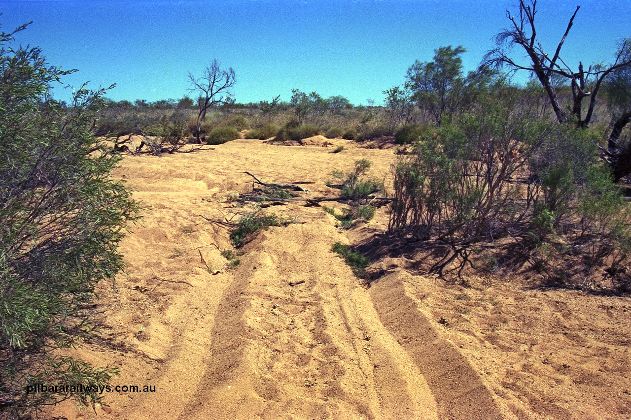 254-28
Enroute to the former Stannum Mine, bogged in a tributary of the Yule River, looking west. GeoData [url=https://goo.gl/maps/xLxgetgysbD45Nhy8]location here[/url]. September 2001. September 2001.
