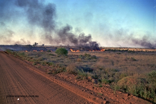 254-05
Walla Siding, 55 km area, spinifex fire beside the access road.
