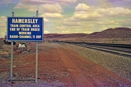 255-36
Emu Siding on the Hamersley Iron Dampier to Tom Price line with the Western Creek Robe River interconnecting line on the left joining the HI Tom Price line. Train Control board for crews to change channels. May 2002.
