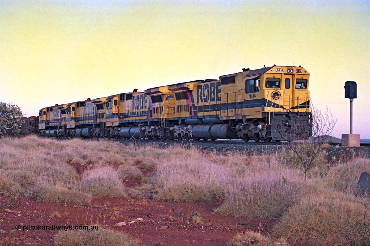256-15
Maitland Siding, early morning loaded train waiting for a meet with an empty behind the quad CM40-8M working of 9414, 9420, 9410 and 9425. May 2002.
Keywords: 9414;Goninan;GE;CM40-8M;8206-11/91-124;rebuild;AE-Goodwin;ALCo;M636;G6060-5;