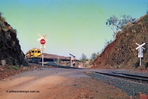 256-31
At the 89.6 km grade crossing and with the meet at Maitland completed the loaded train continues onto Cape Lambert behind the quad CM40-8M working. May 2002.
Keywords: 9414;Goninan;GE;CM40-8M;8206-11/91-124;rebuild;AE-Goodwin;ALCo;M636;G6060-5;