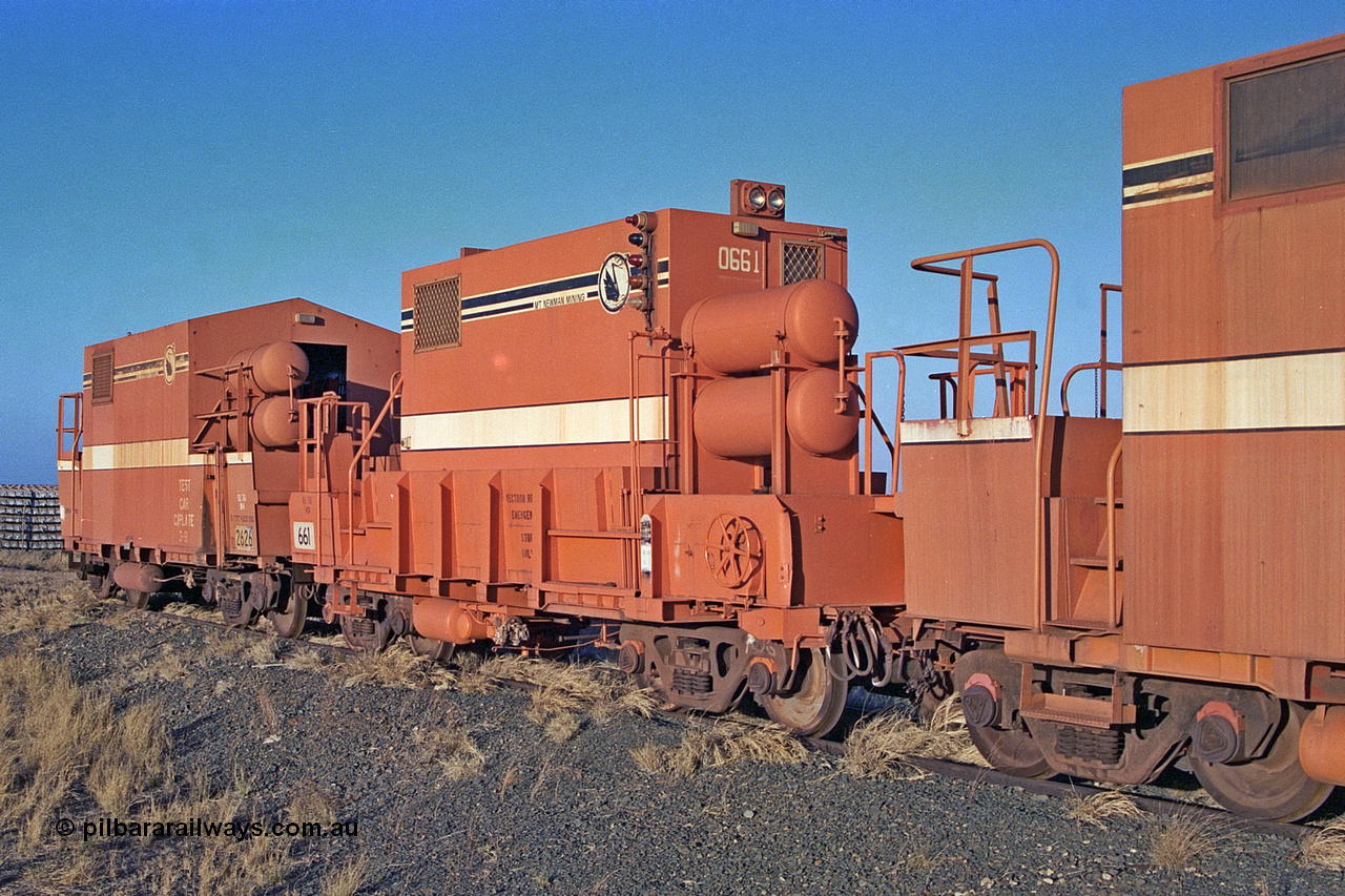 257-13
Flash Butt yard, Locotrol II remote waggon 661 which is modified from a Magor USA ore waggon in the late 1980s with Locotrol I remote waggon 2626 modified from a Comeng ore waggon in the 1980s. Late 2001.
