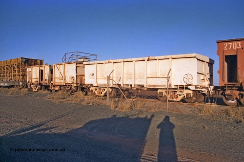 257-21
Flash Butt yard, compressor waggon set No. 5. Modified Magor USA built ore waggons 548 and 585 to form the compressor set, used during the unloading process. Late 2001.
Keywords: Magor-USA;BHP-compressor-set;